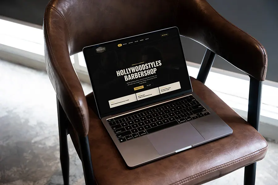Hollywood Styles Barbershop website mockup featuring modern booking tool.