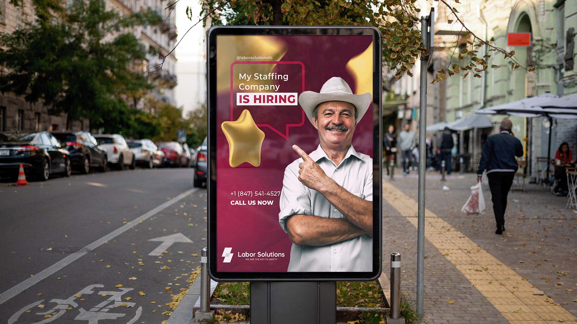 Staffing recruitment advertisement displayed in an urban street poster mockup.